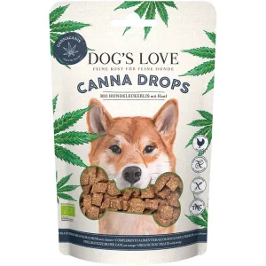 Perro disfrutando de las chuches Canna Drops, ideales para reducir el estrés y mejorar el bienestar.